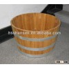 round wooden flower planter with hoop iron