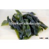 Salted kelp cut, salad laminaria, salted seaweed food, sea kelp knot