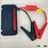 Vehicle jump starter with alarming light