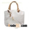 Handbag made of PU leather material with small pockets for SS16