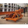 TSX Mill Liner Handler is a mobile crane featuring a horizontal movable beam with a three stage tele