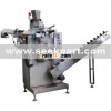 SNUS machine