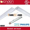 Gullwing surface mounted fluorescent luminaire