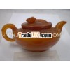 orange color resinous tea pot,  antique tea pots