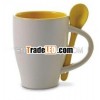 White ceramic cup and spoon