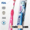 Plastic And Rubber Toothbrush With Comfortable And Flexible Handle In Three Different Colored Materi