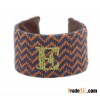 Monogram needlepoint bracelet/leather cuff