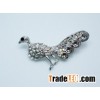 Peacock brooch