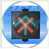 Red cross and green arrow led traffic light